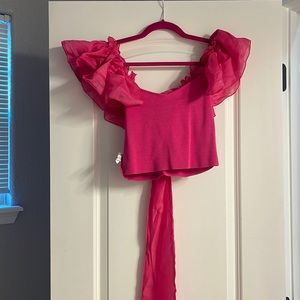 Top ties in a bow in the back